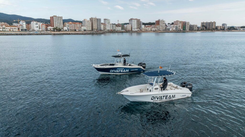 Divateam's fishing boats, the Hydrasports Vector 2500cc and Boston Whaler Outrage 220, cruising off Palamós